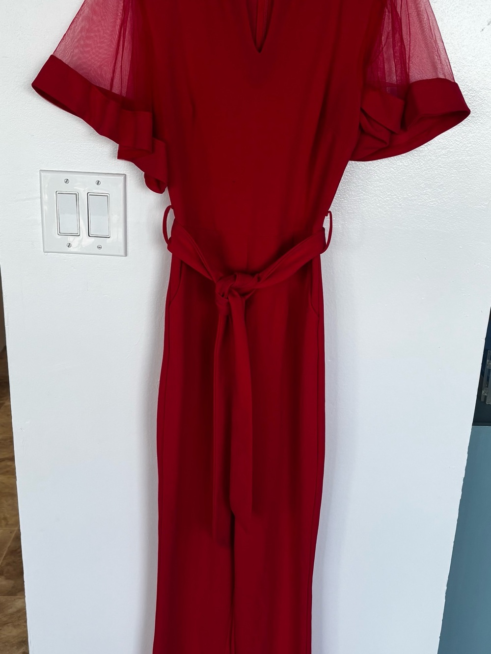 Red Belted Jumpsuit with Sheer Sleeve Detail